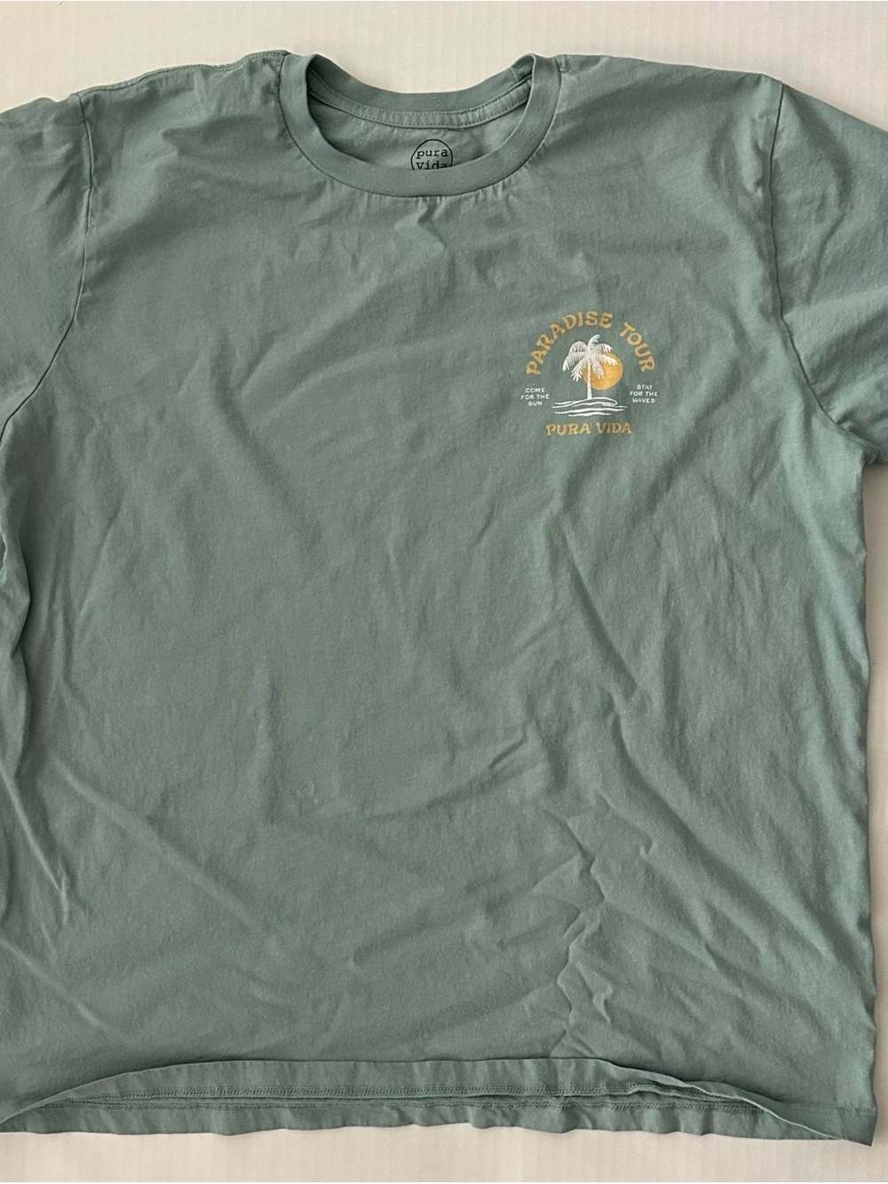 Pura Vida Sage Green Paradise Tour Short Sleeve Tee with Yellow Graphic